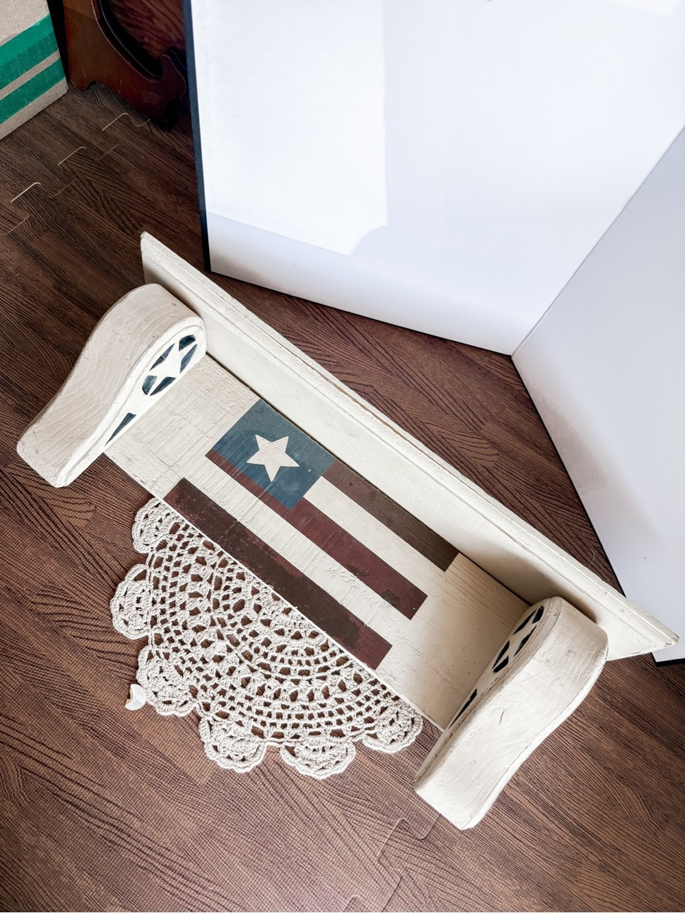 Vintage-Style Cream Wooden Wall Shelf with Flag Accent